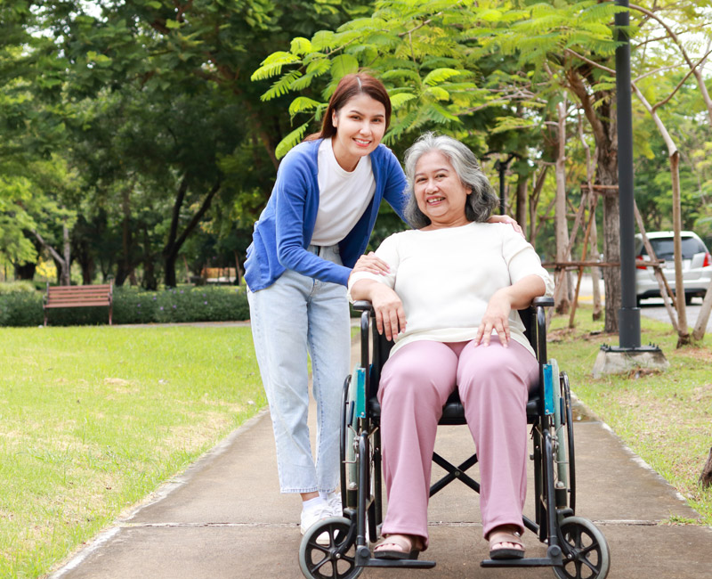 Elderly disabled women with a carer | What are live-in care costs