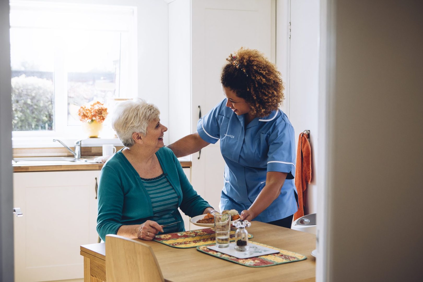 Elderly women with carer | Dom Care with Promedica24